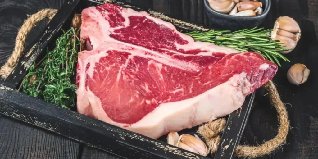 A fresh cut of high-quality Grass Fed Beef Near Me vibrant red color and excellent marbling, perfect for sustainable and healthy eating.